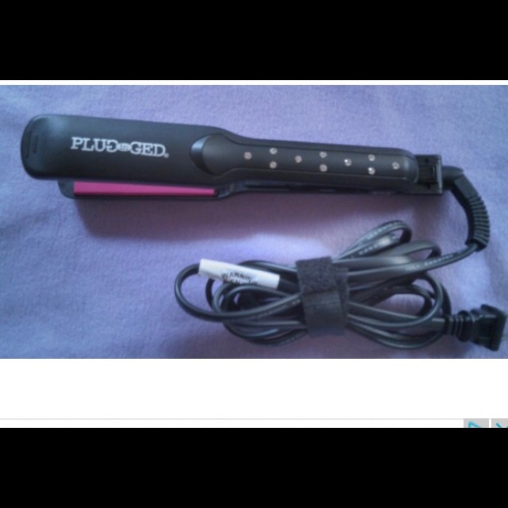 Plugged in flat iron